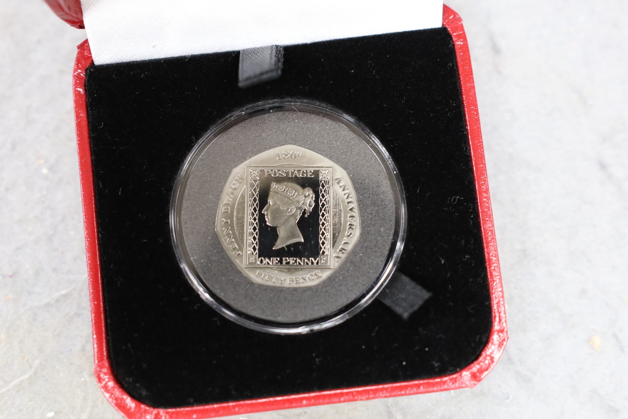 Five assorted silver proof sets.